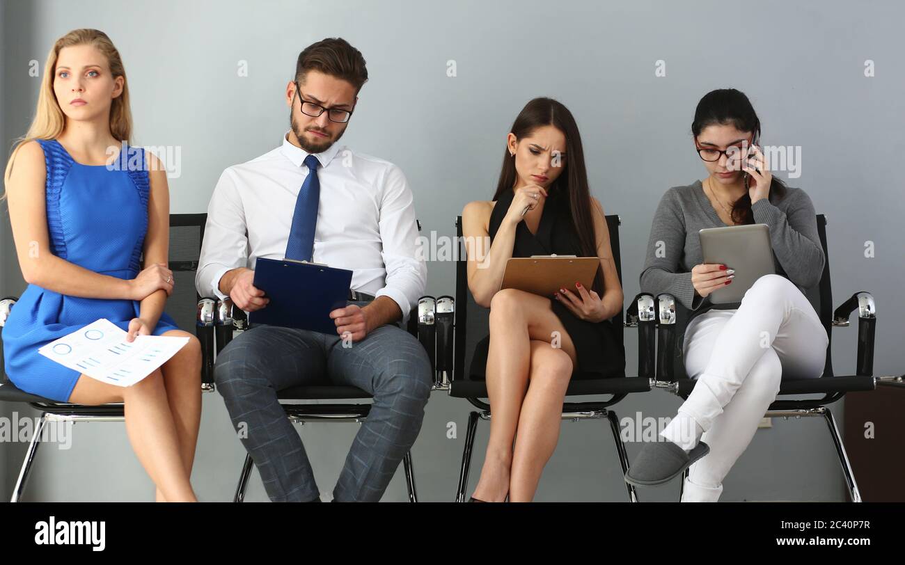 Group of people sitting on chairs during job casting Stock Photo