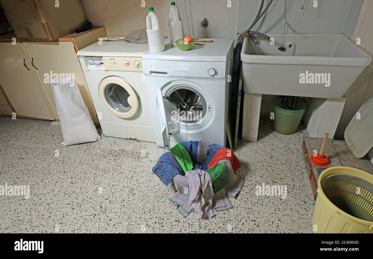 two washing machines in the laundry room of the community house Stock