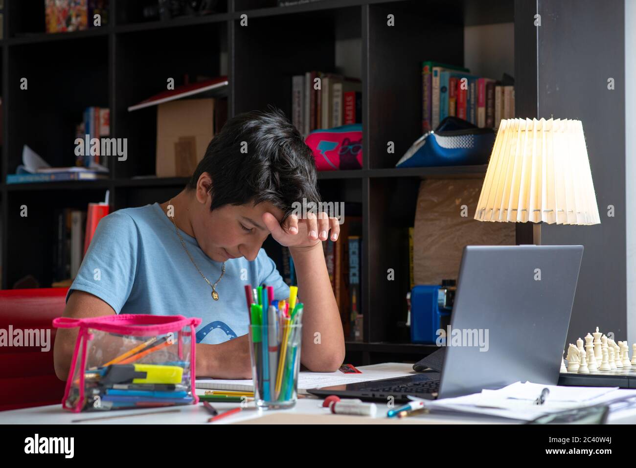 Boy study lone at home during covid 19 lockdown, UK Stock Photo