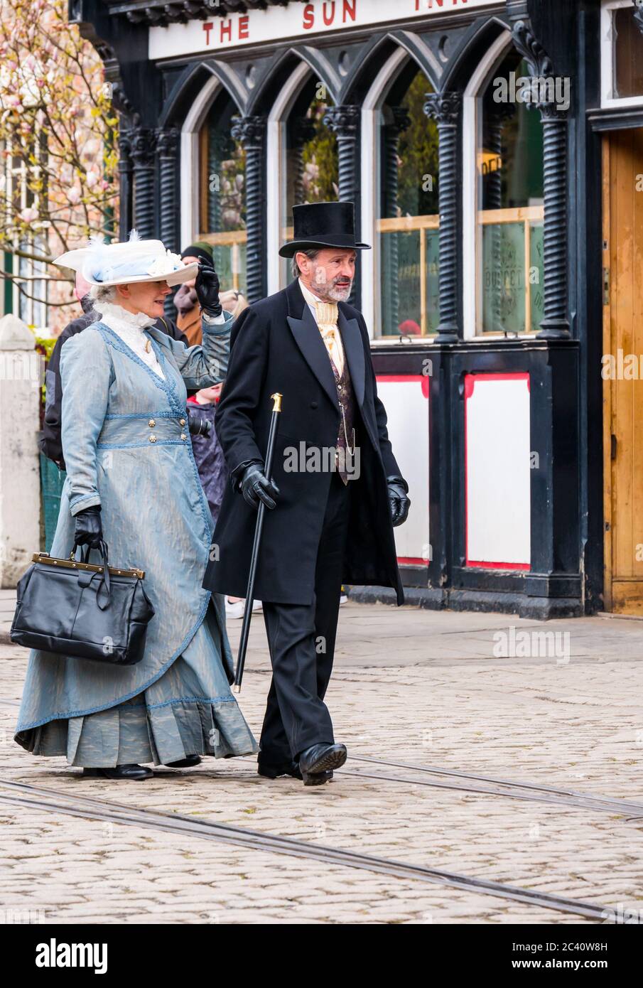 Older couple dressed in 19th century period costume, Beamish Museum, Durham County, England, UK Stock Photo