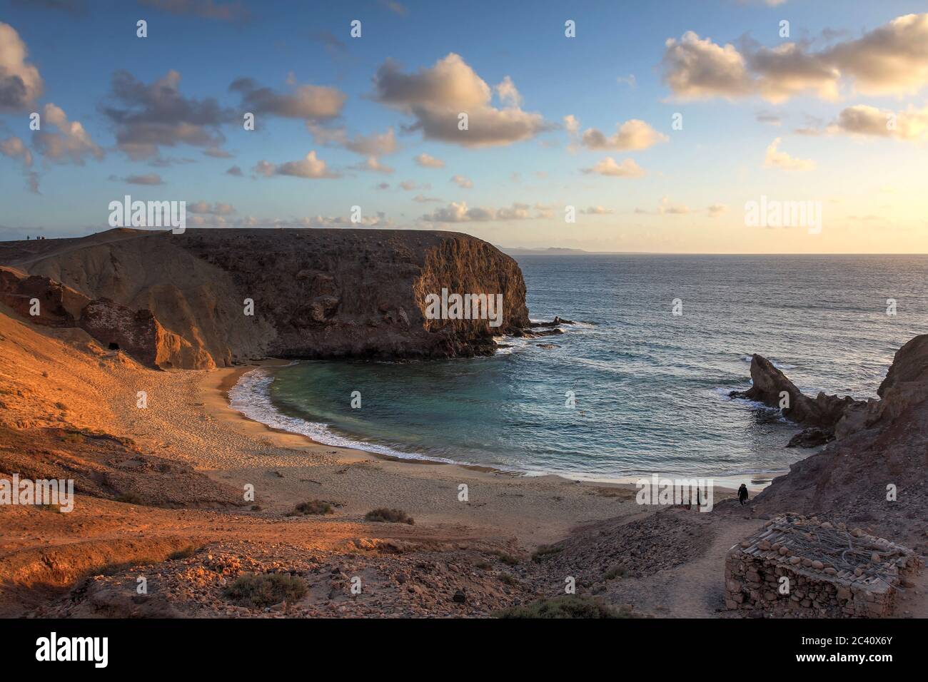 Landscape with the famous Papagayo Beach on the Lanzarote Island in the Canary Islands Ahipelago, Spain at sunset time. Stock Photo