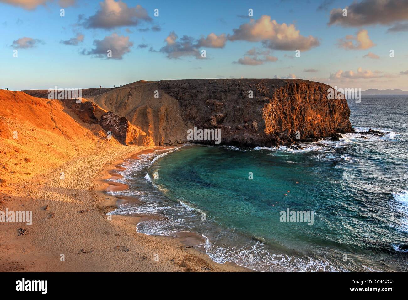 Landscape with the famous Papagayo Beach on the Lanzarote Island in the Canary Islands Archipelago, Spain at sunset time. Stock Photo