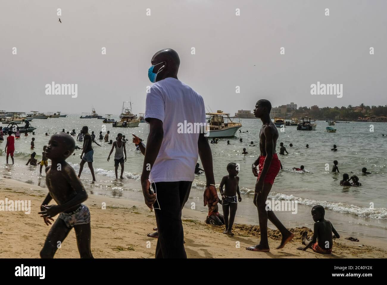 Dakar, Senegal. 21st June, 2020. People enjoy their time on a beach in Dakar, Senegal, 21, 2020. Senegalese Ministry Health and Social Actions registered on Tuesday 64 new confirmed