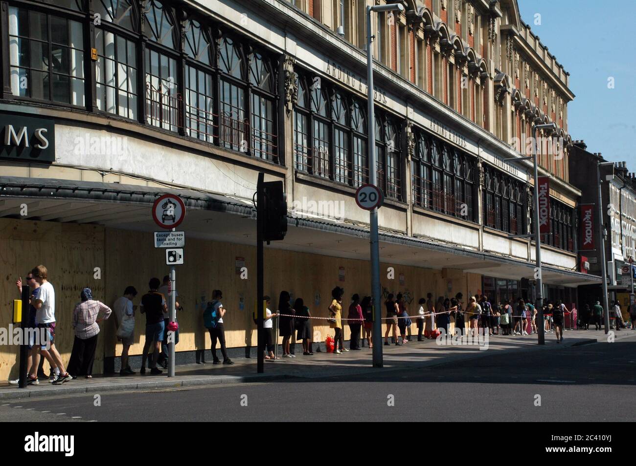 London, UK. 23rd June, 2020. Long queues at TK Maxx on Tuesday