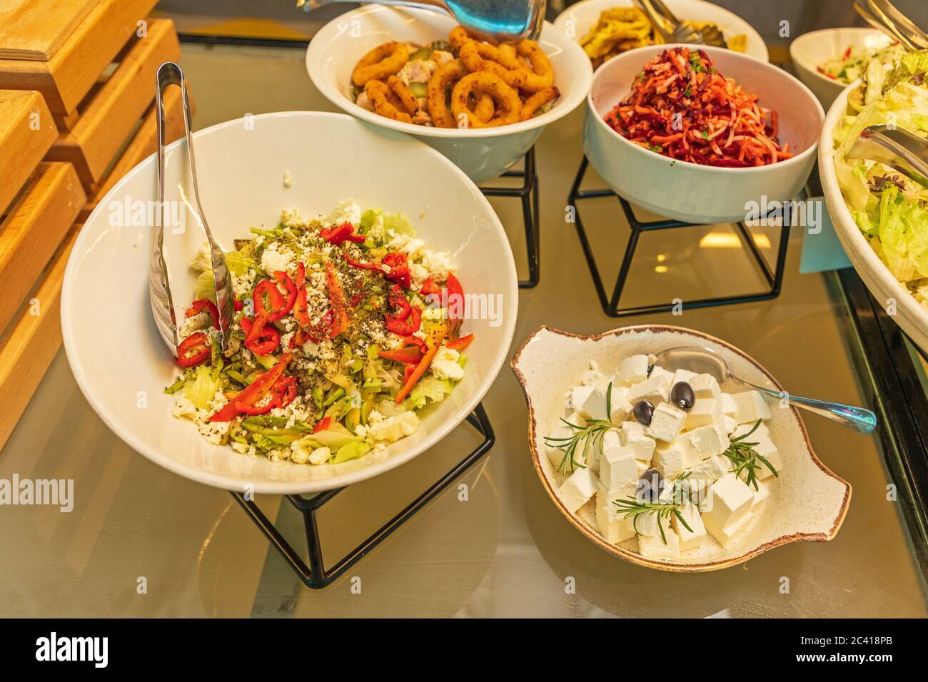 Big Selection of Salads in Bowls Buffet Table Stock Photo