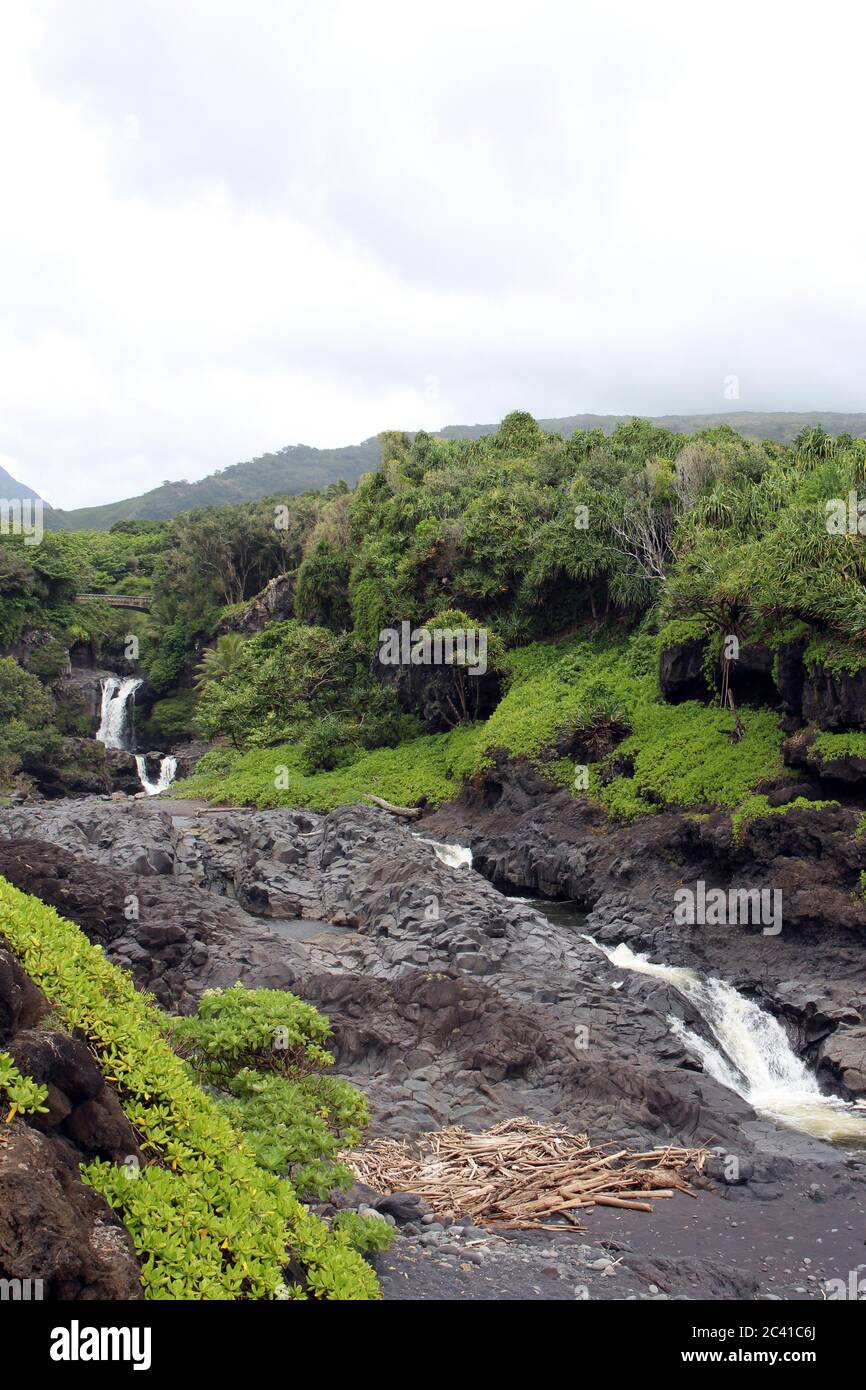 Multiple waterfalls of the Seven Sacred Pools, O'heo Gulch, in Haleakala National Park, Maui, Hawaii, USA Stock Photo