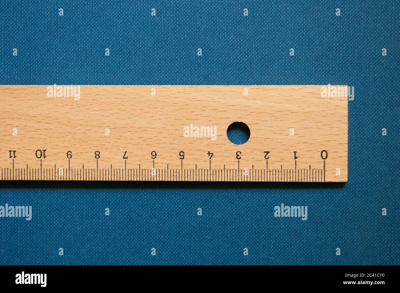 Ink Bleed Ruler Bleed - wooden ruler Stock Photo - Alamy