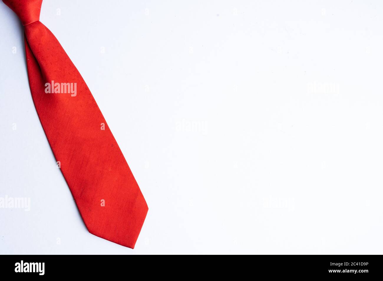 Red neck tie isolated on white with copy space for text Stock Photo