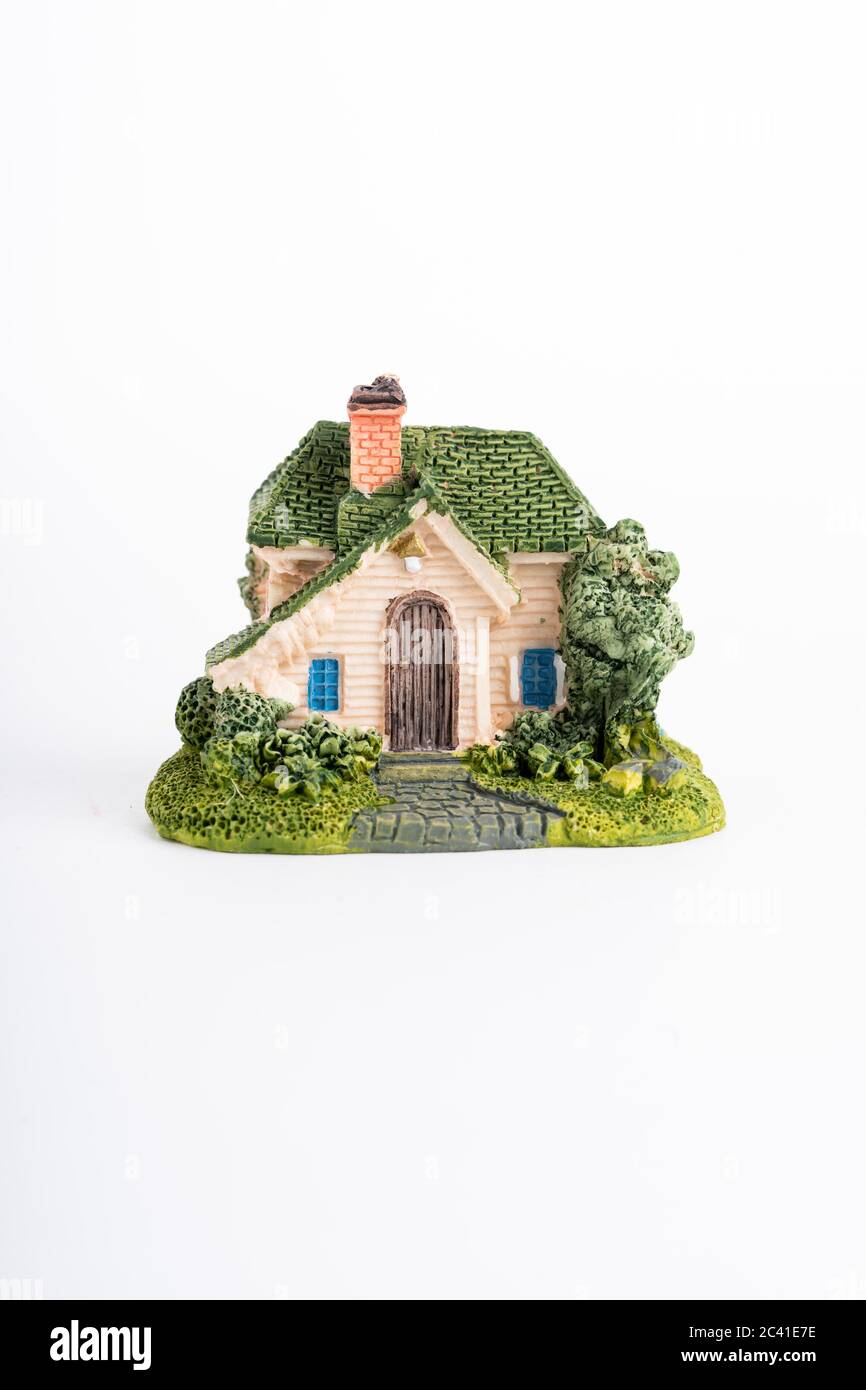 Miniature house isolated on white background Stock Photo - Alamy