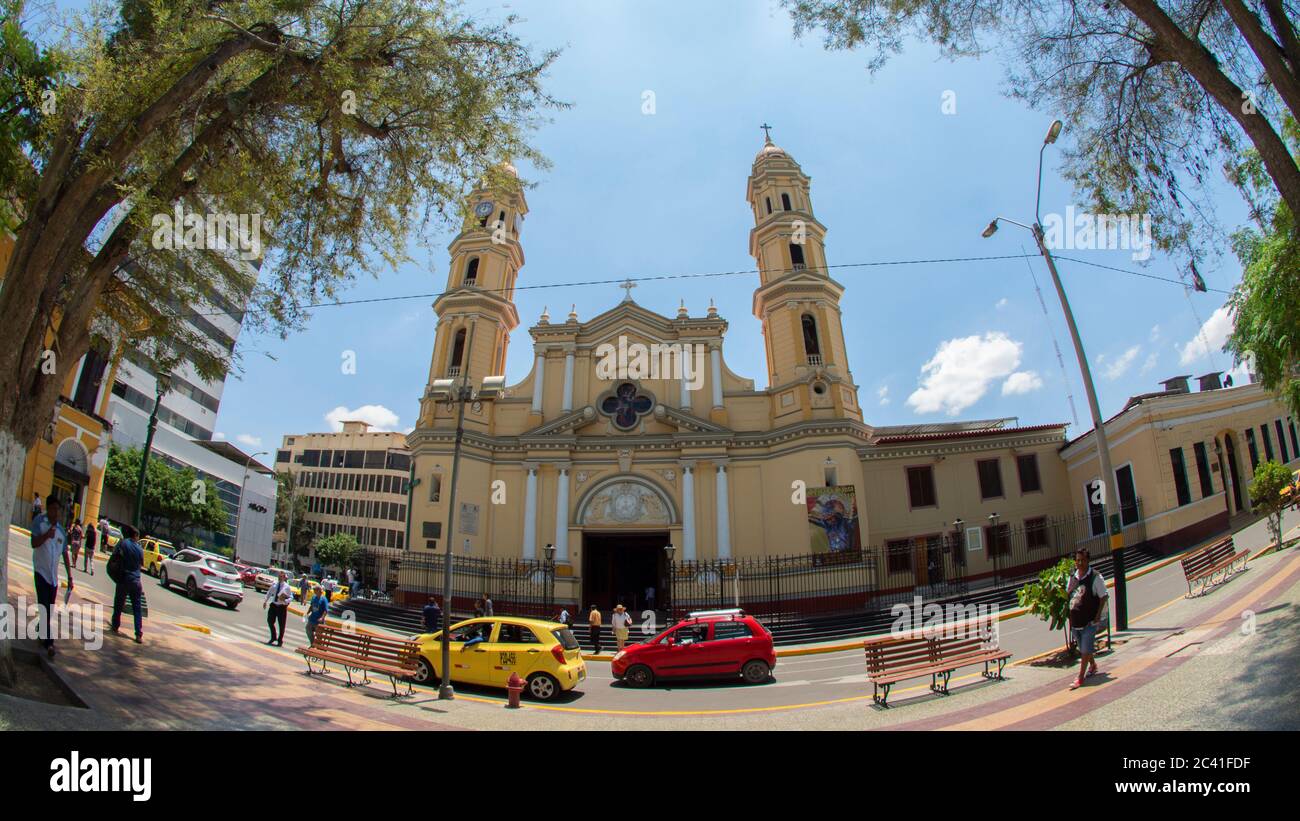 San Miguel de Piura, Piura / Peru - April 5 2019: Cars circulating next to the Cathedral of Piura in the center of the city Stock Photo