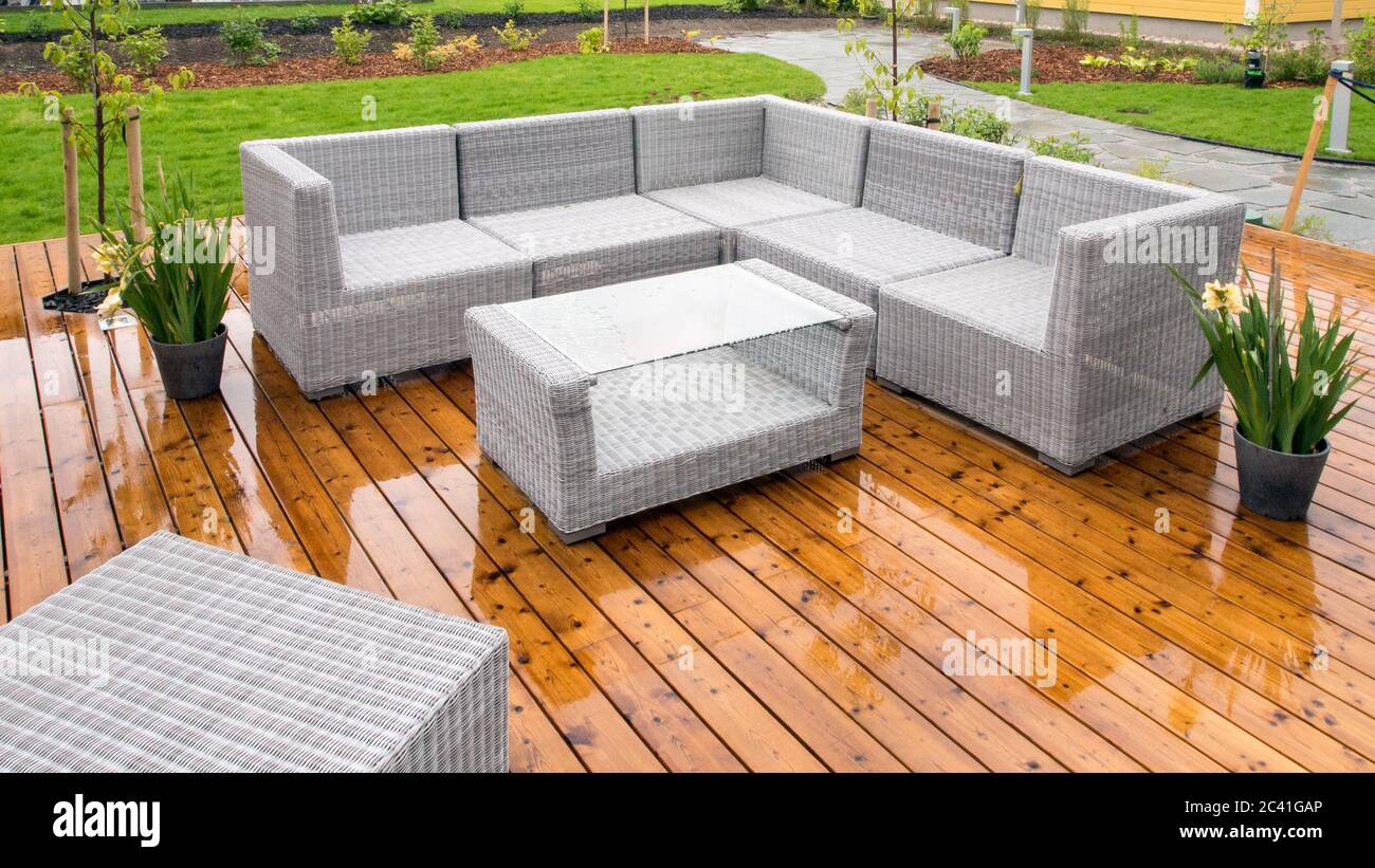 Patio furnitures outside in a rainy day Stock Photo Alamy