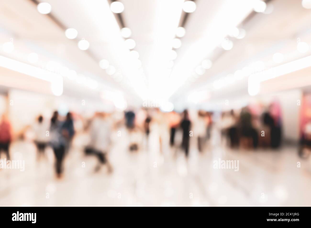 Abstract blur people in exhibition hall event background, defocused tradeshow event exhibition, business convention show, job fair, technology expo. O Stock Photo