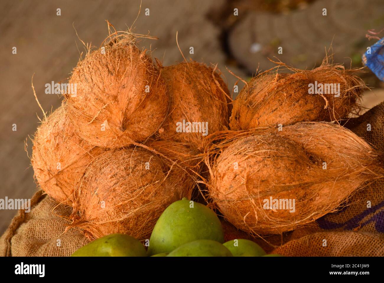 pile of coconuts in the market, coconuts ready for sales Stock Photo