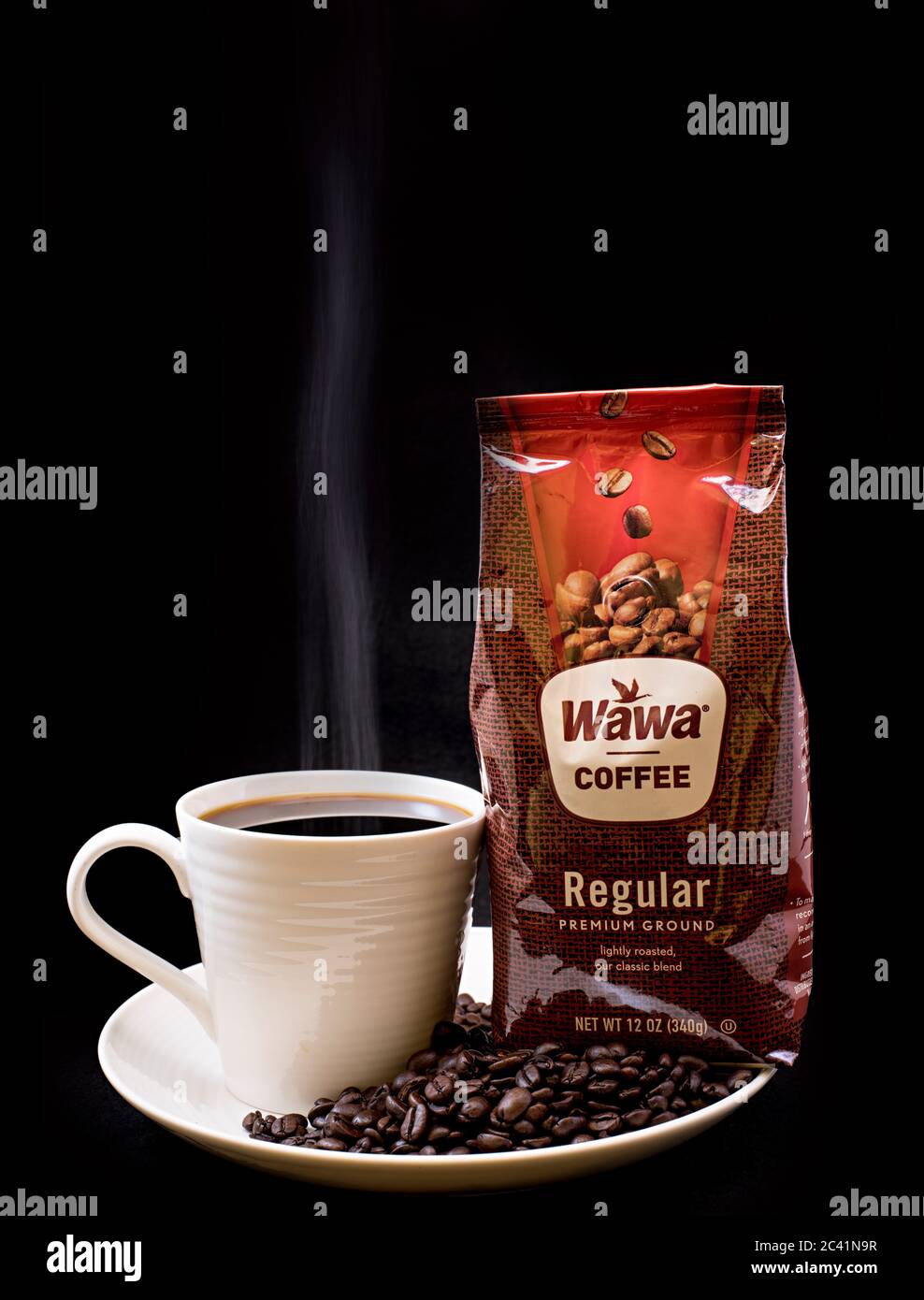 Premium Vector  Steaming cup of coffee on white background