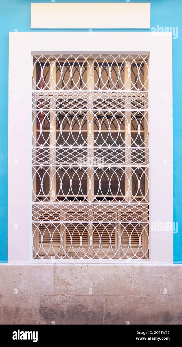 Typical decorative iron bars in windows hires stock photography and
