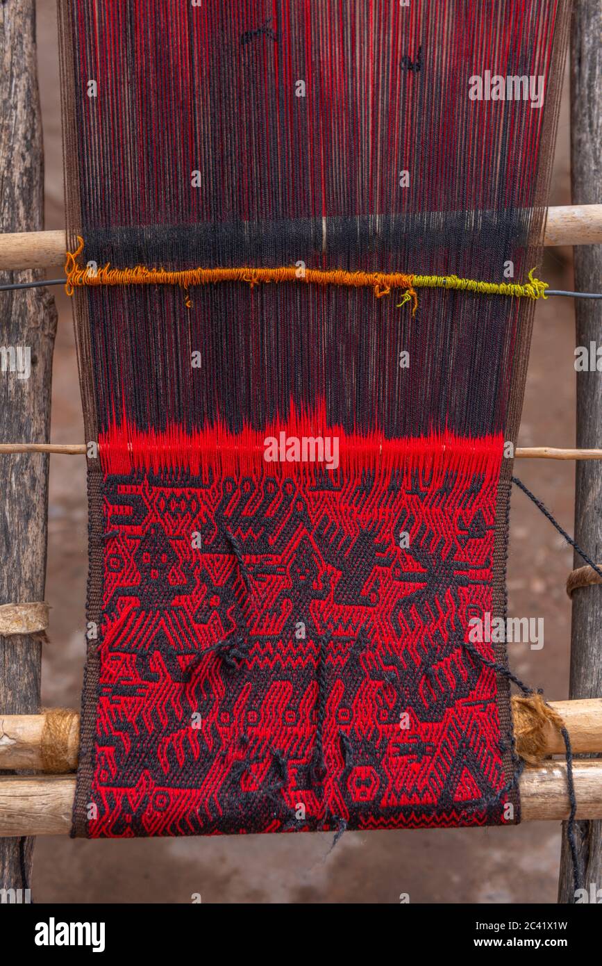 Weaving of  local red and black Jalq´a art pattern,  Potolo, Departamento Chuquisaca, Municilality Sucre,Bolivia, Latin America Stock Photo
