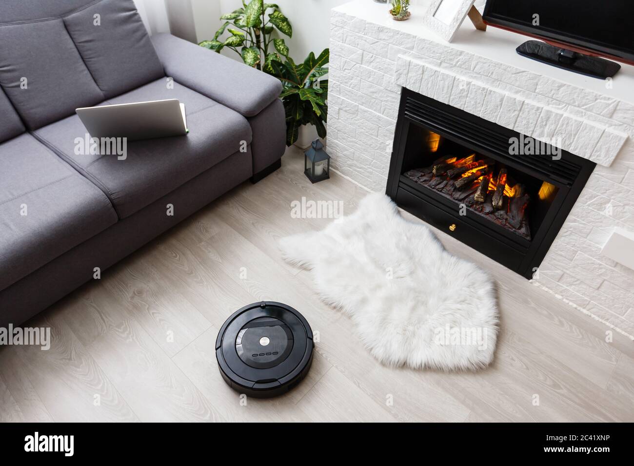 robotic vacuum cleaner on the floor Stock Photo Alamy