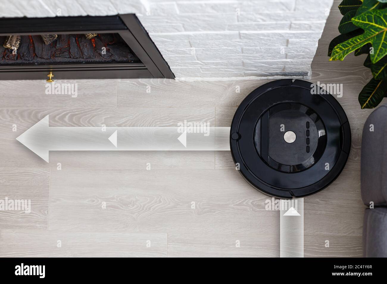 Robotic vacuum cleaner on laminate wood floor smart cleaning technology