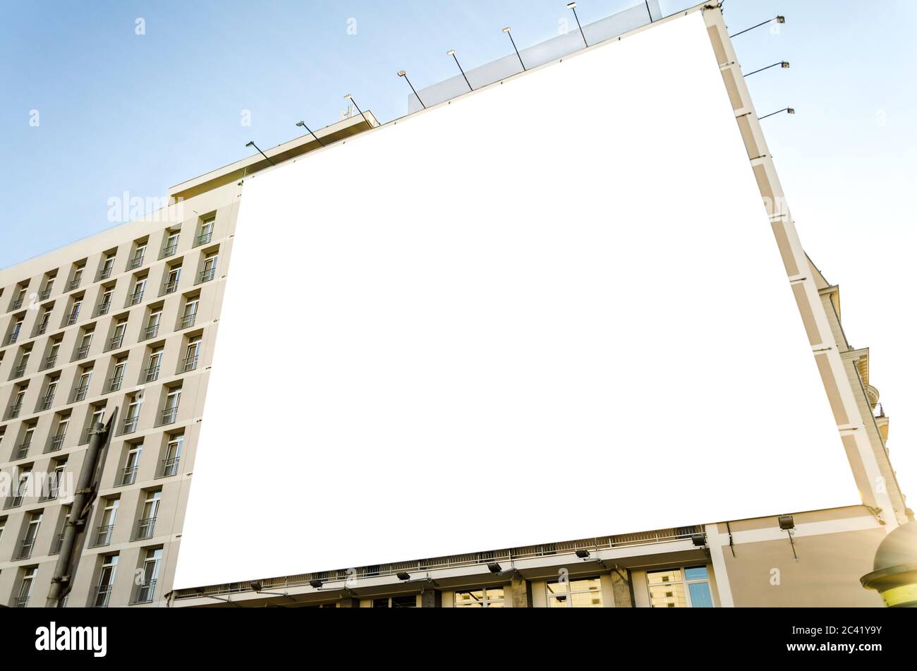 Large blank billboard on a modern building in the city Stock Photo