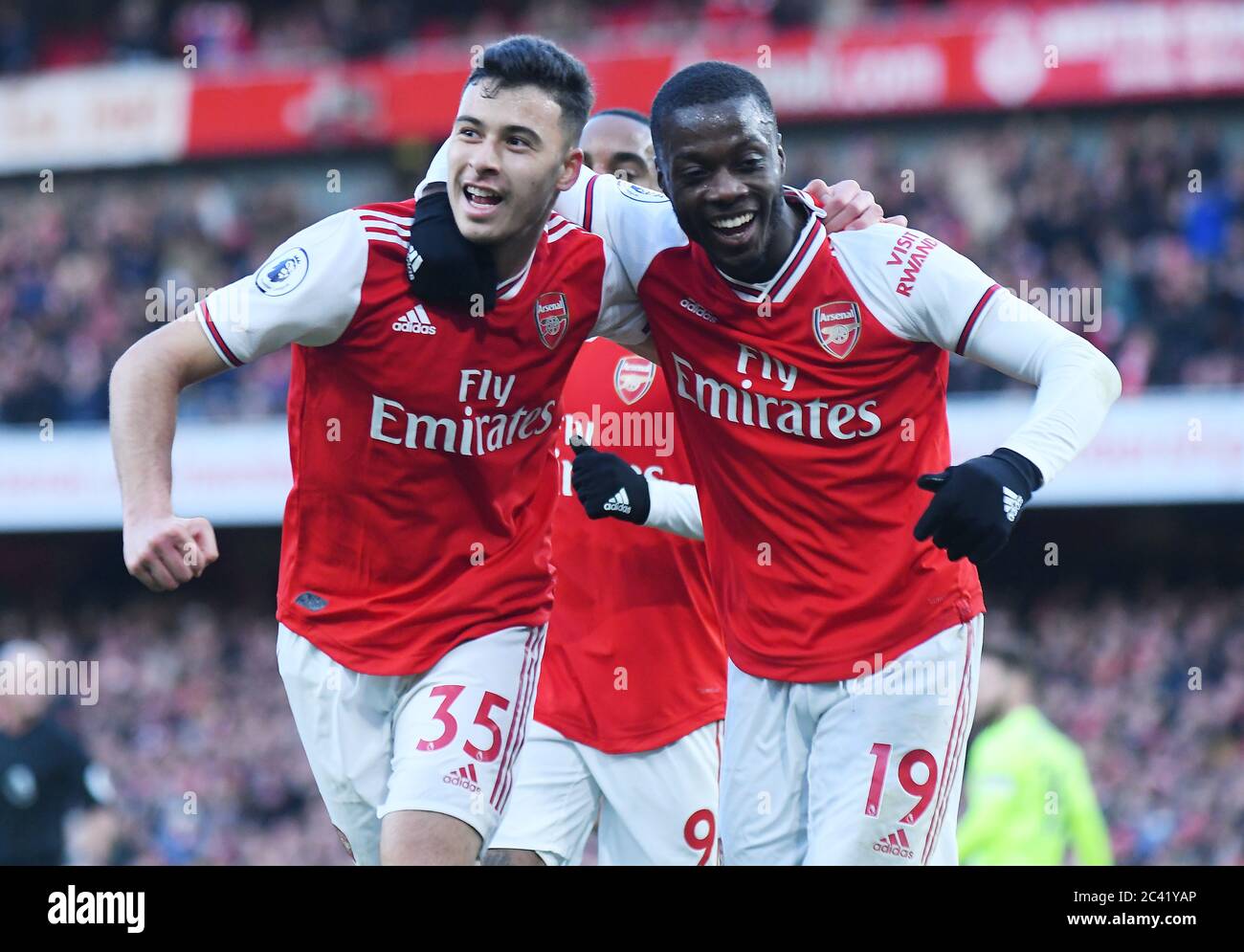 LONDON, ENGLAND - JANUARY 18, 2020: Gabriel Martinelli of Arsenal and Nicolas Pepe of Arsenal celebrate a goal scored during the 2019/20 Premier League game between Arsenal FC and Sheffield United FC at Emirates Stadium. Stock Photo