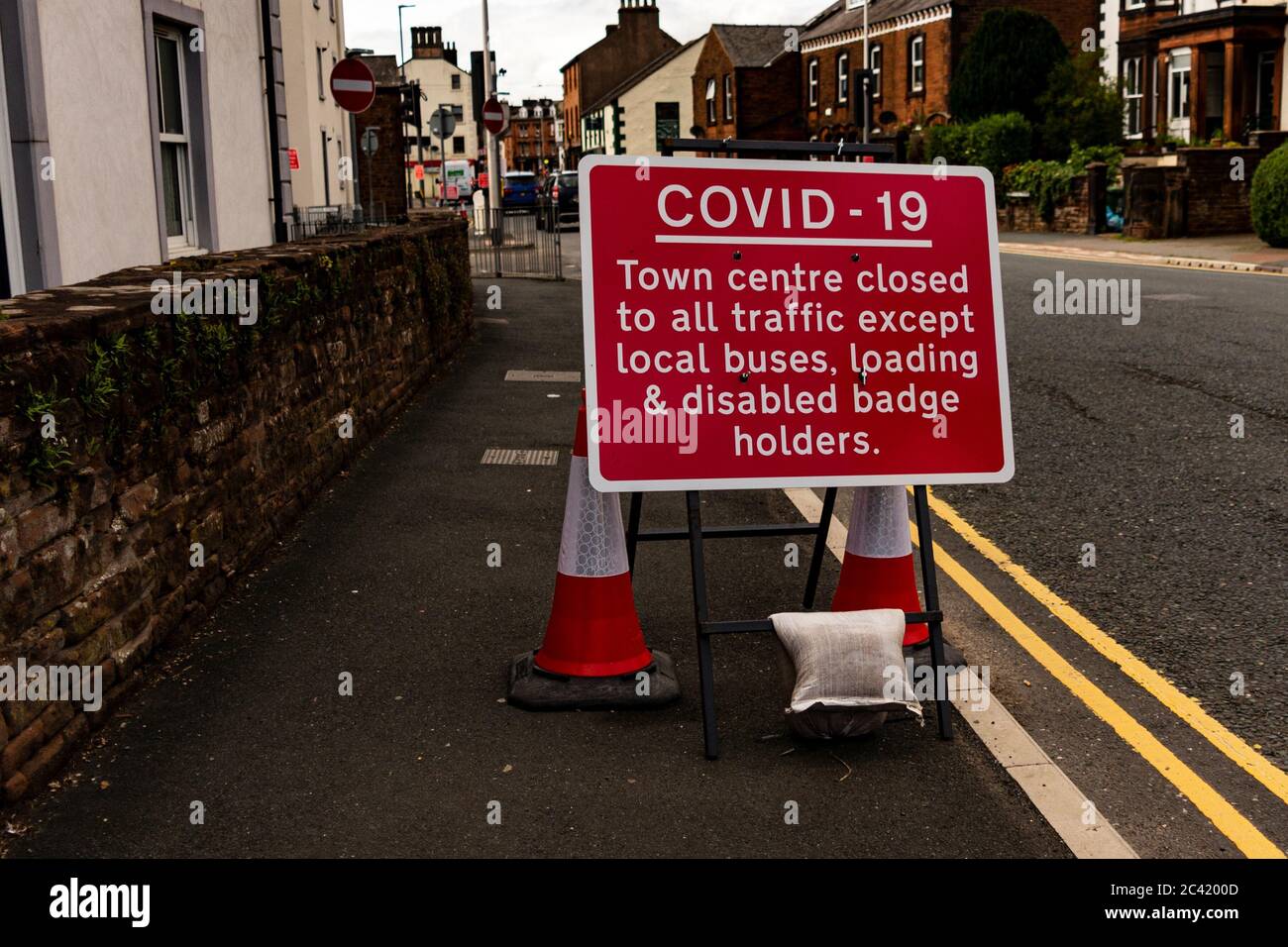 A road closure sign for Covid-19 social distancing measures in Penrith Cumbria Stock Photo