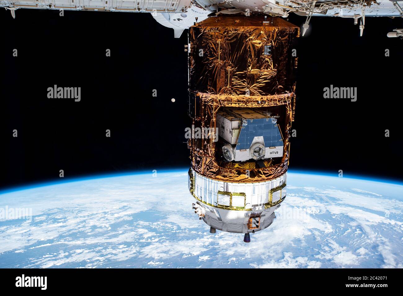 H-II Transfer Vehicle-9 (HTV-9), Japan's resupply ship, attached to the International Space Station's Harmony module. HTV-8 cargo pallet stowed inside Stock Photo
