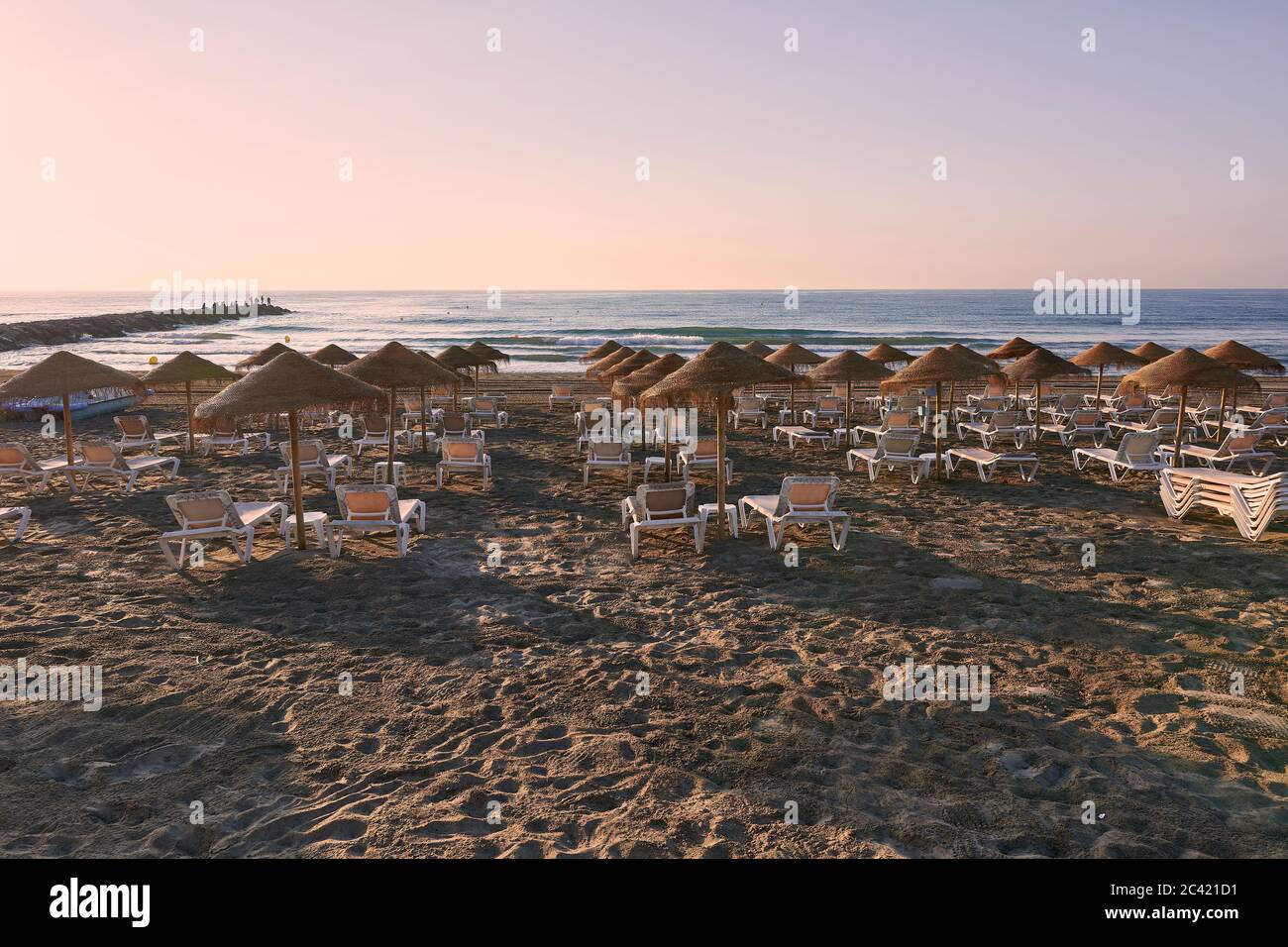Parasols and hammocks on the beach, sunrise, bar Stock Photo Alamy