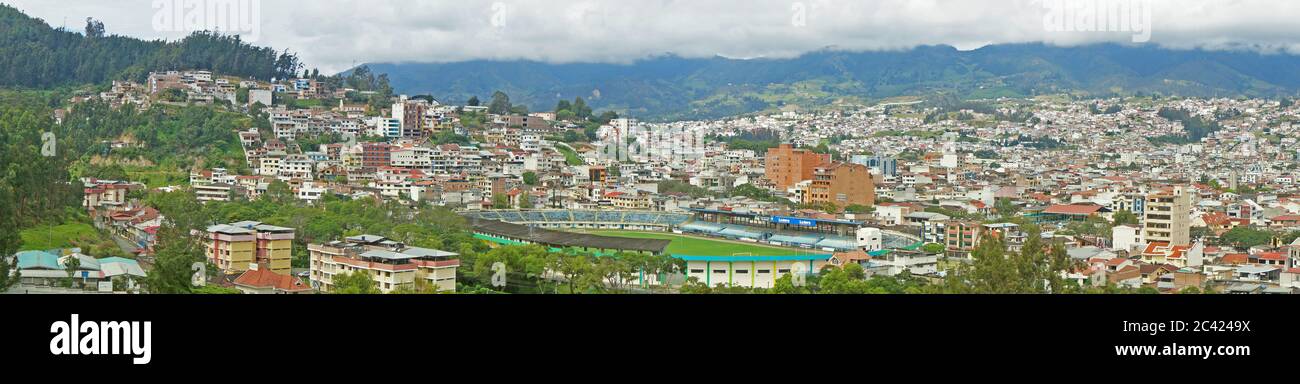 Inmaculada Concepcion de Loja, Loja / Ecuador - April 3 2019: Panoramic wide view of the city of Loja in Ecuador with mountains on the horizon on a cl Stock Photo