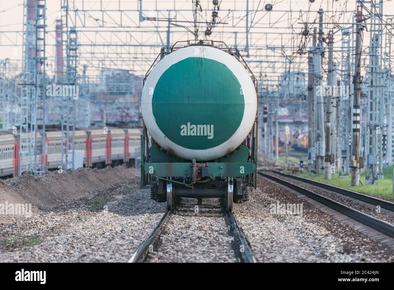 Freight train with oil approaches to the station Stock Photo - Alamy