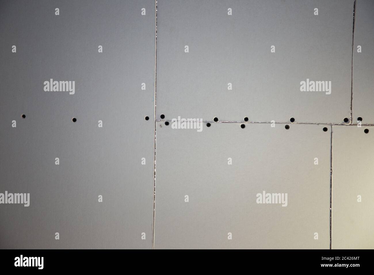 plasterboard background drywall getting ready to plaster Stock Photo