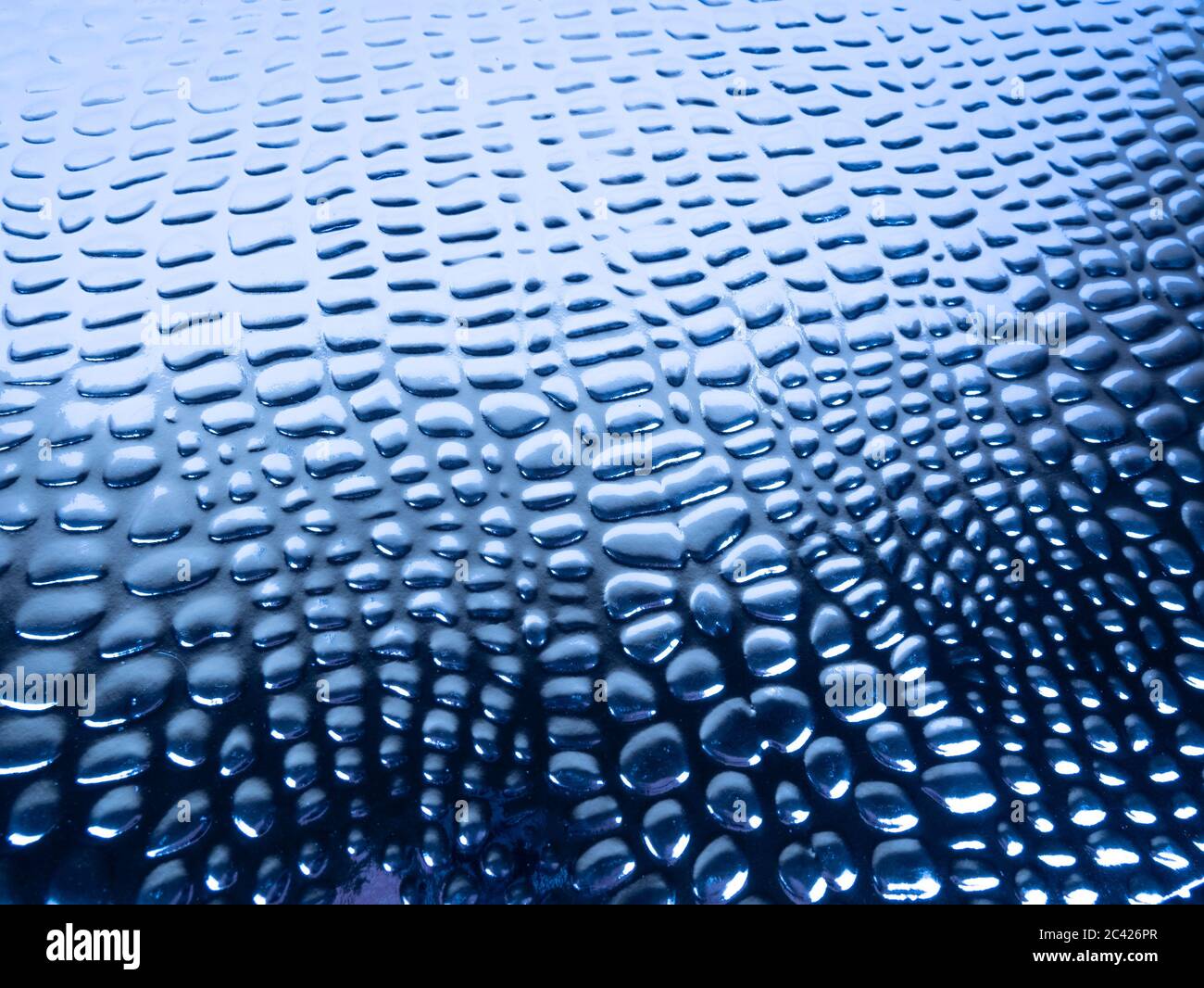 Close-up blue metallic snake skin background Stock Photo