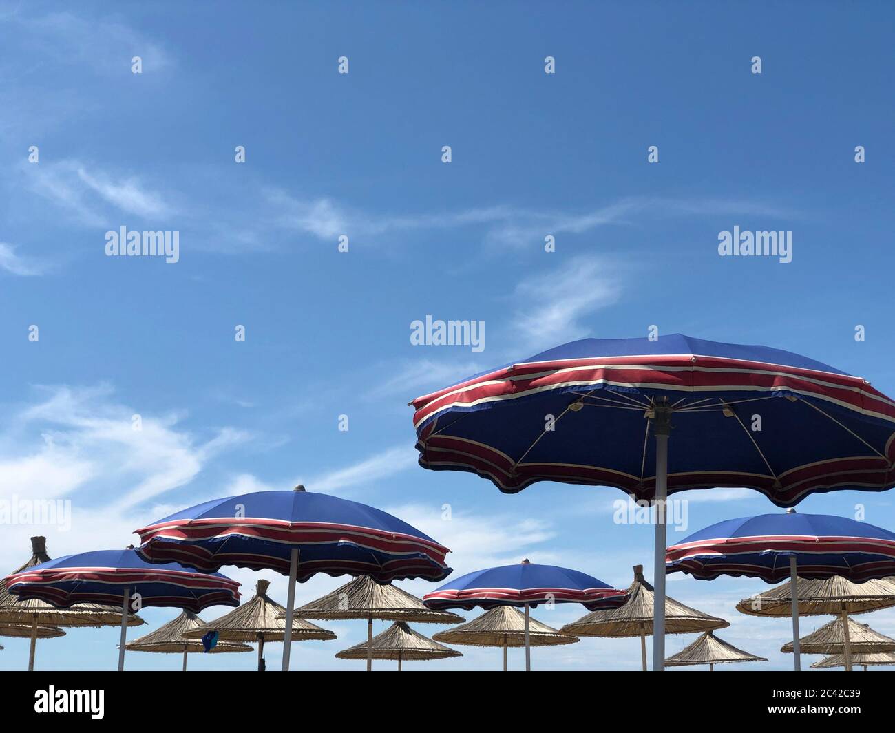 Beach umbrella blowing in wind hires stock photography and images Alamy