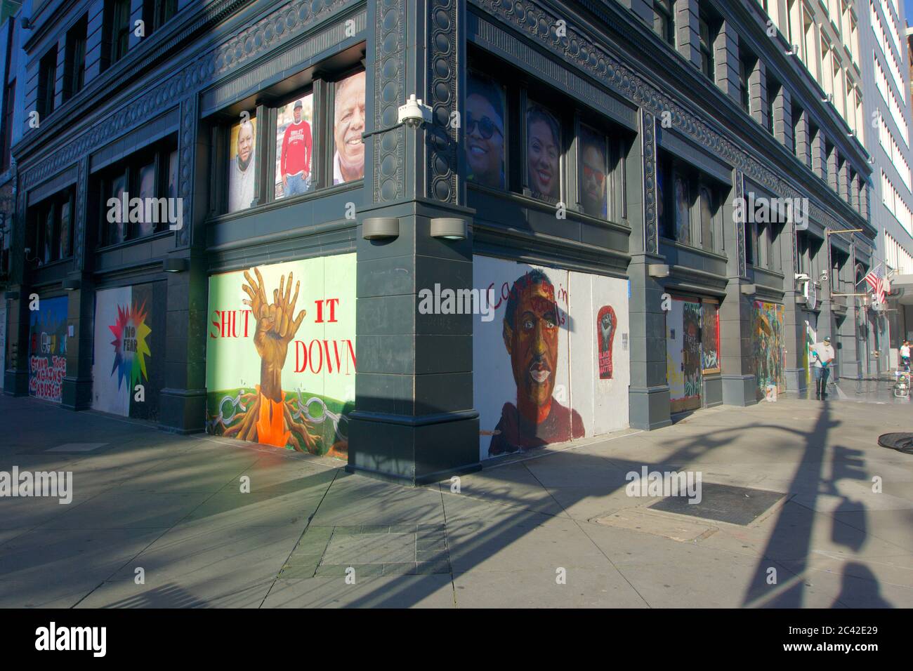 Black Lives Matter protest street art on boarded up buildings after the ...