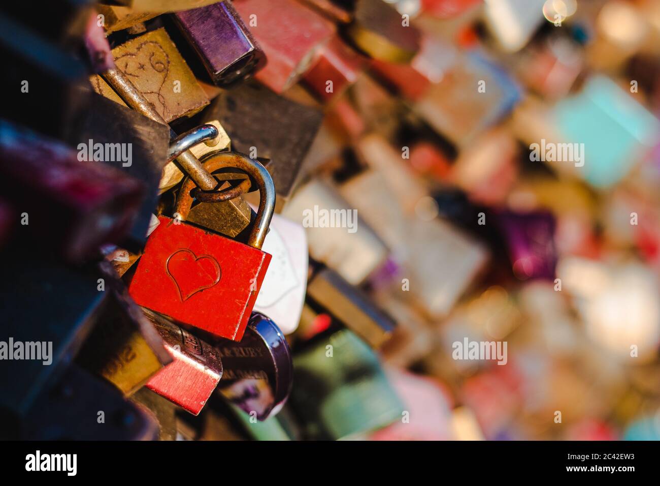 A lot of padlock of love in a bridge Stock Photo Alamy