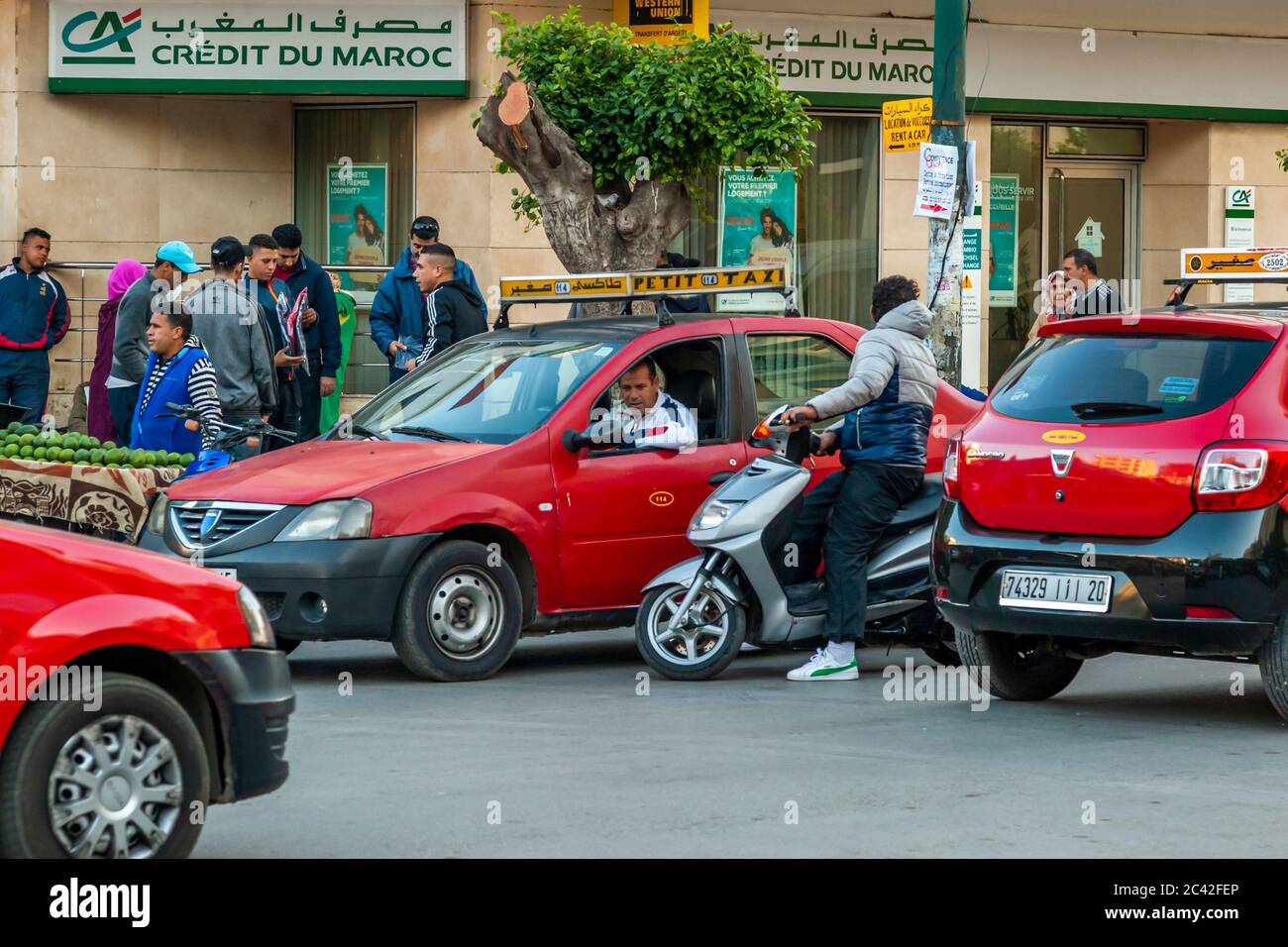 The red petit taxis are the cheapest means of transport in Fez, Morocco Stock Photo