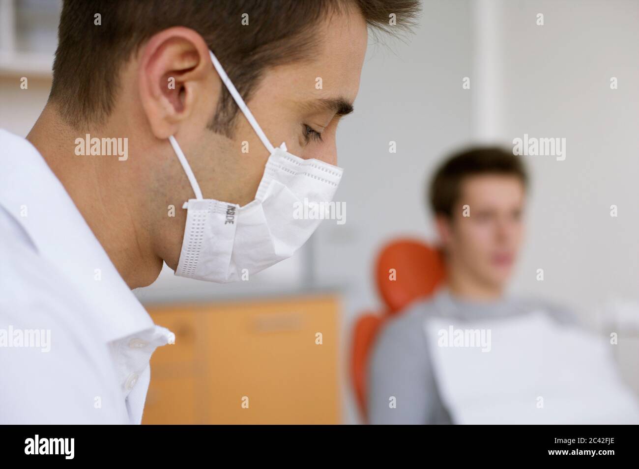 Dentist with face mask Stock Photo