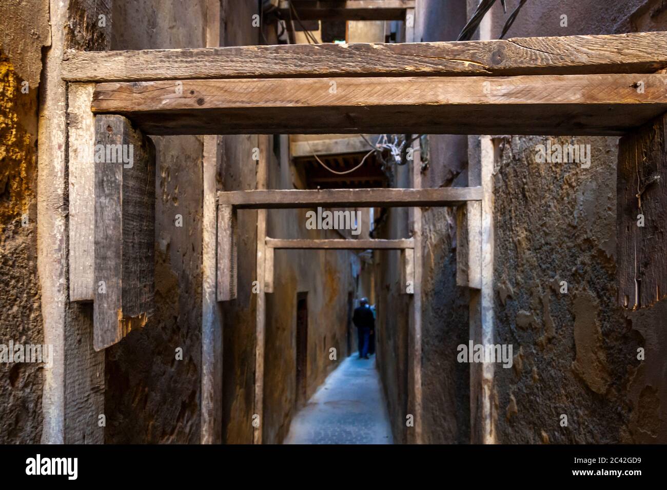 Impressions of Morocco: The narrow streets of Fez must be protected with beams Stock Photo