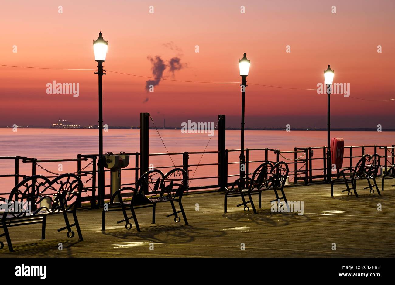 An after sunset view at Southend on Sea, Essex, UK on the end of the longest pleasure pier in the world. Stock Photo