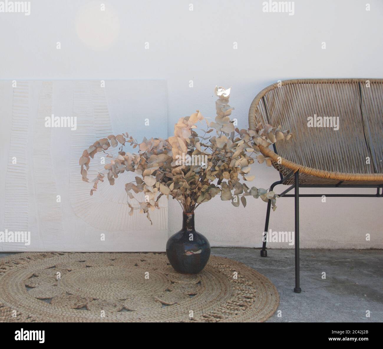 Terrace interiors with eucalyptus flower vase Stock Photo Alamy