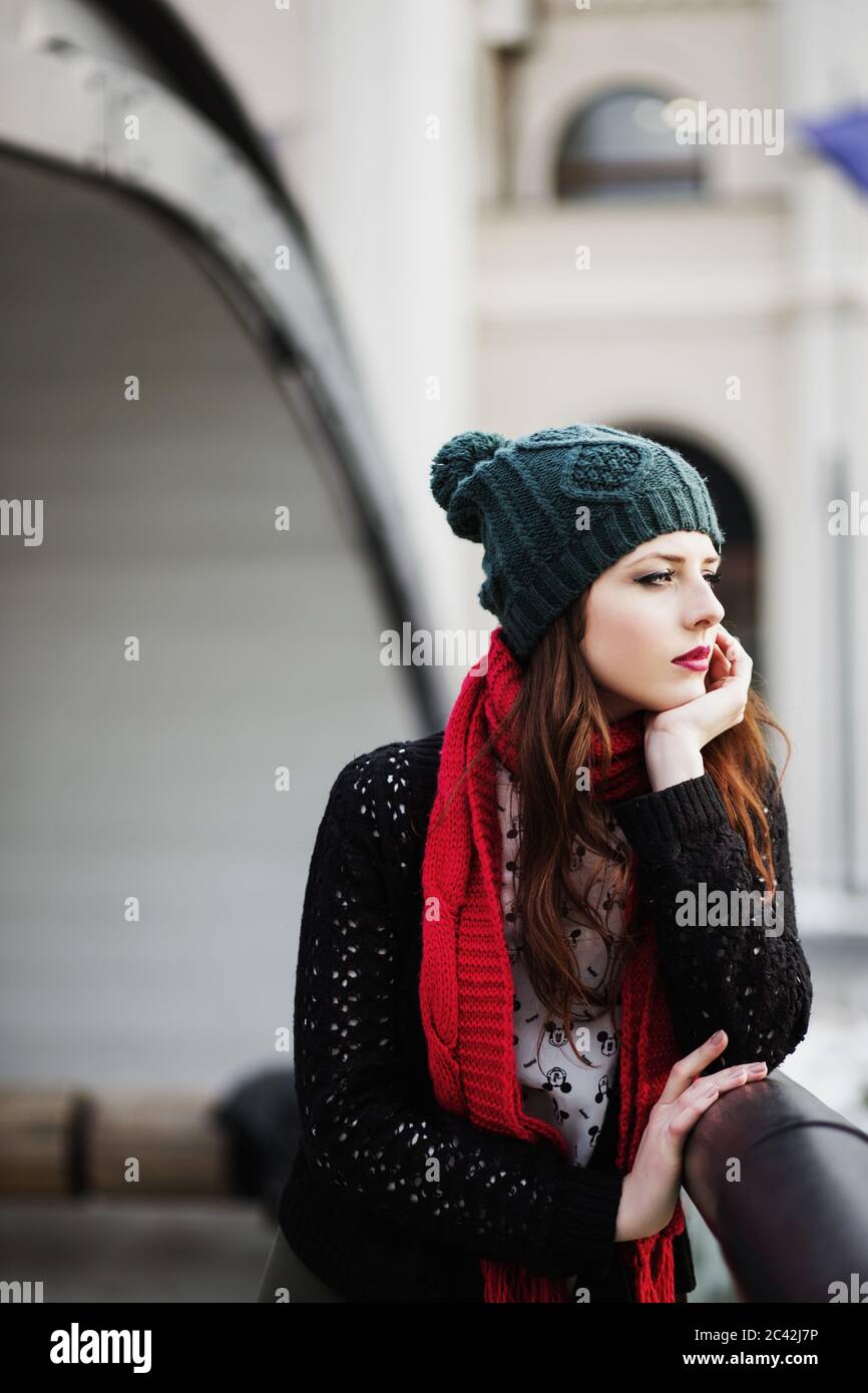 Beautiful young woman standing on the bridge Stock Photo