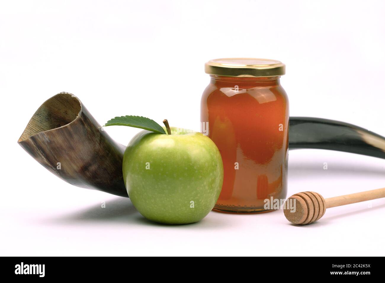 Apple and honey a snack eaten by jews in Rosh Hashana. Shofar A horn used in the jewish