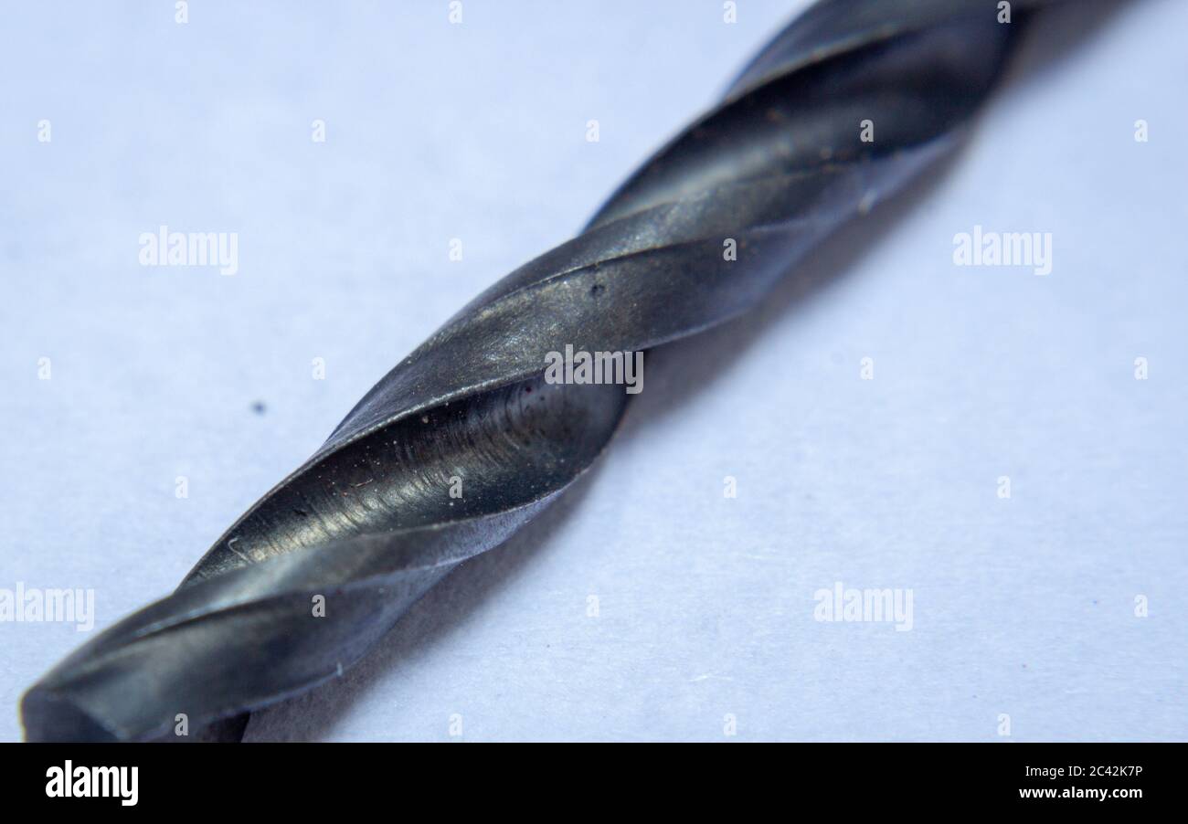 Close up on the cutting edge of a carbon drill, used in wood and soft