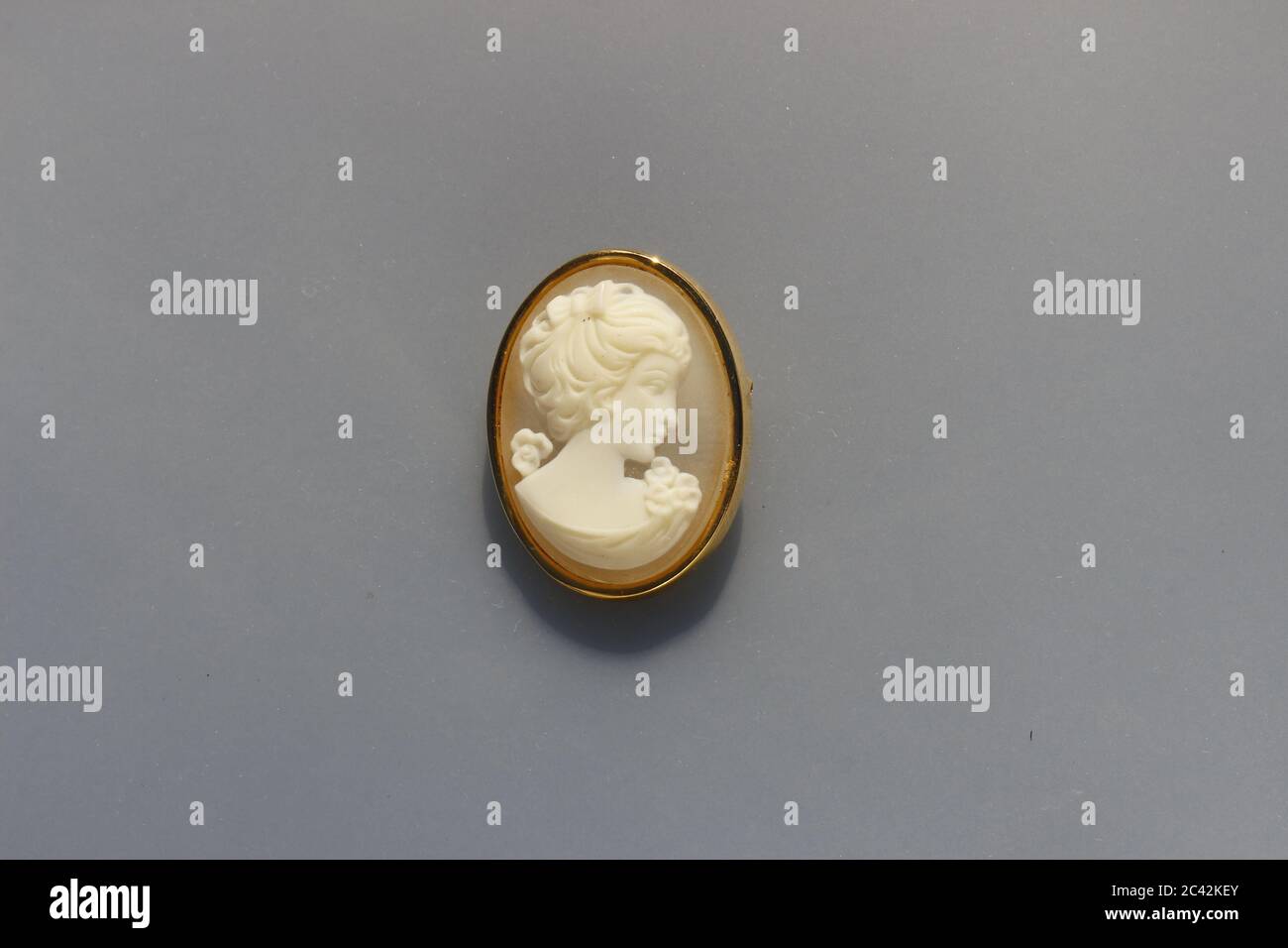 Vintage cameo style brooch costume jewelry Stock Photo - Alamy
