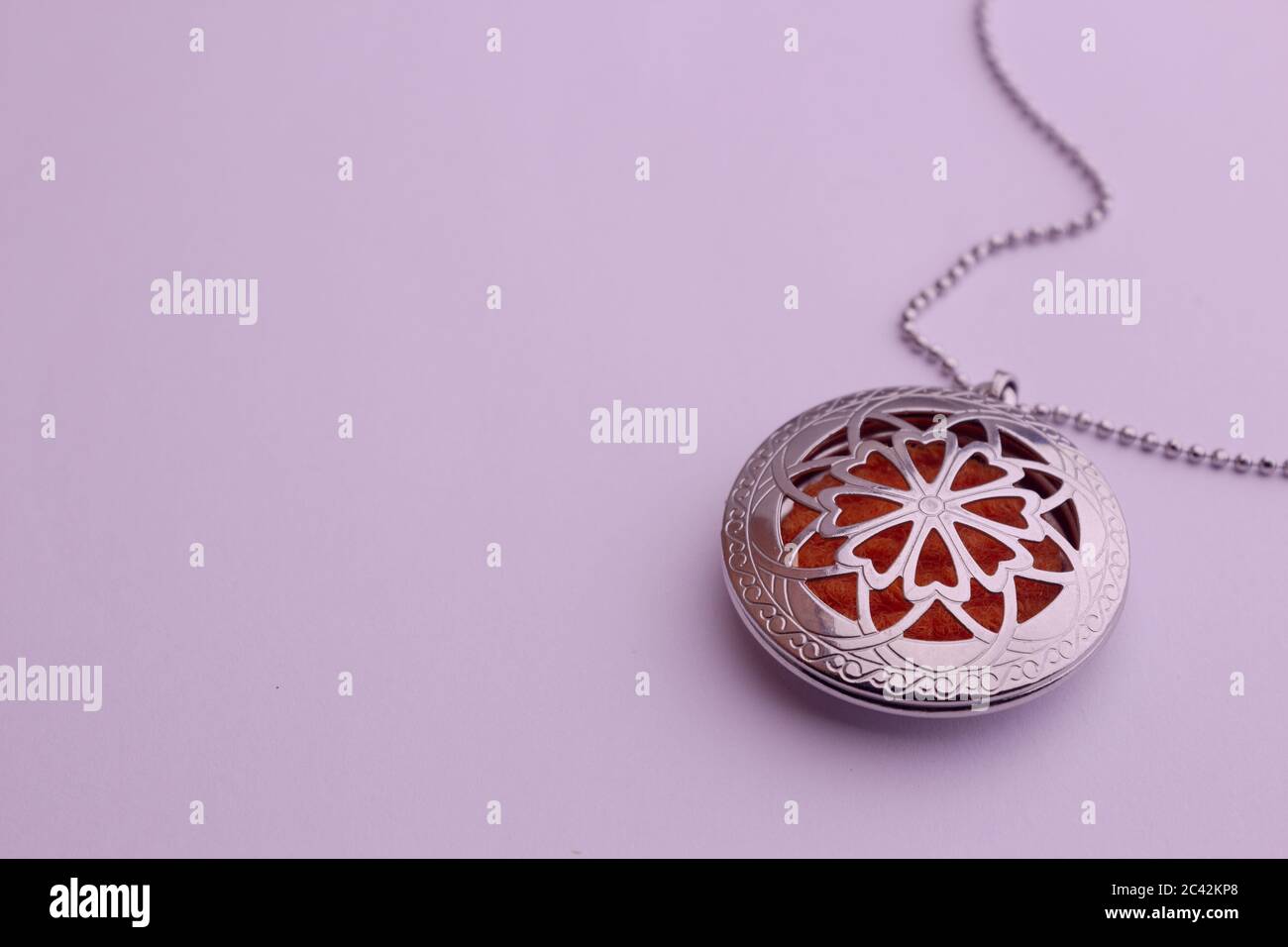 Essential oil infuser used as pendant of a necklace Stock Photo Alamy