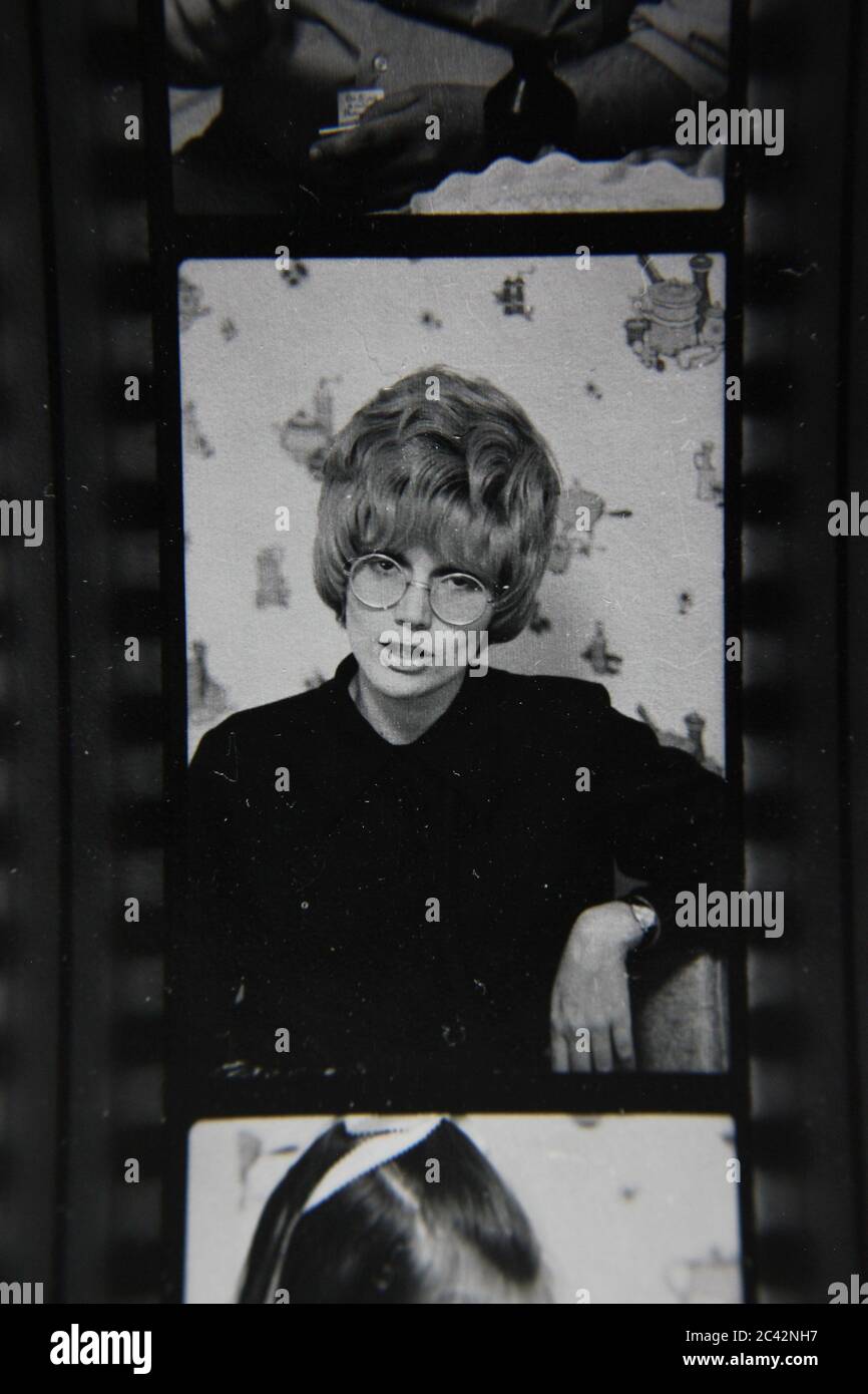 Fine 1970s vintage black and white photography of a young thirty something woman having a good time. Stock Photo