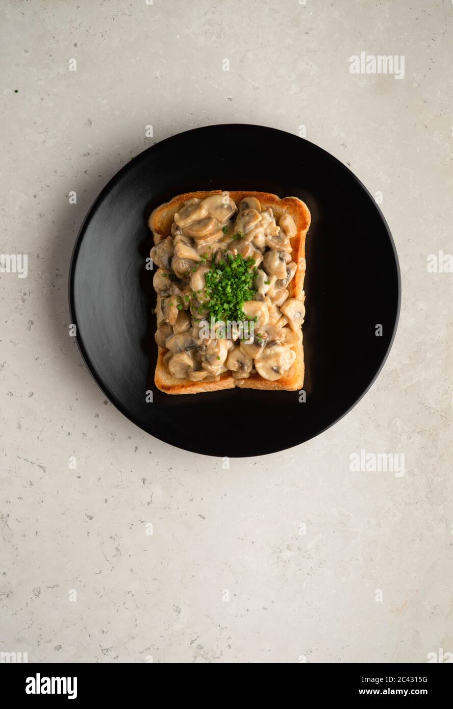 Mushrooms on toast Stock Photo Alamy
