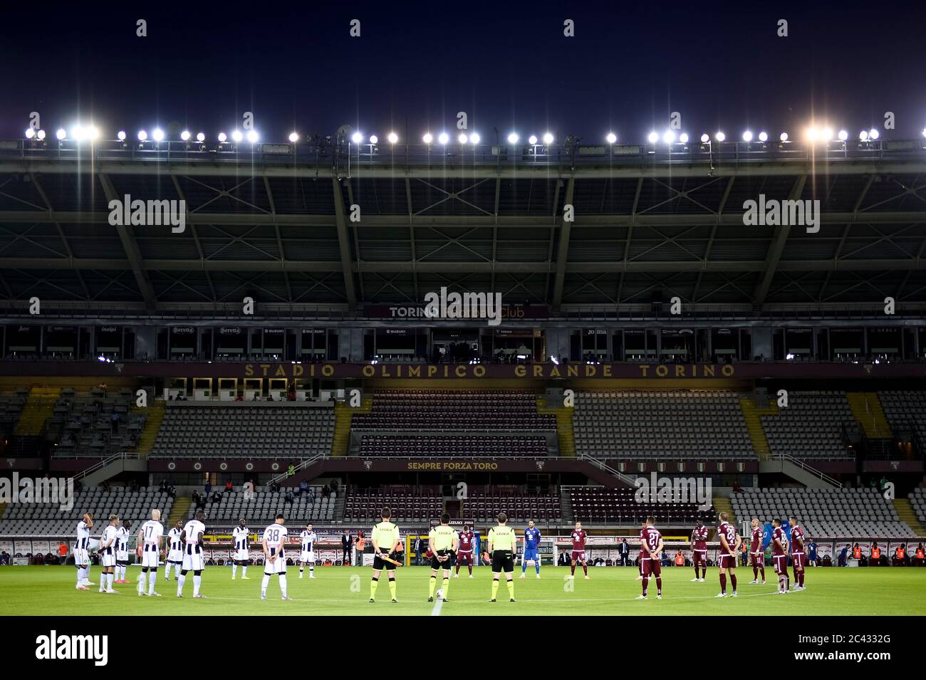 Turin, Italy - 23 June, 2020: Players and referees hold a minute's silence for the victims of COVID-19 prior to the Serie A football match between Torino FC and Udinese Calcio. Credit: Nicolò Campo/Alamy Live News Stock Photo
