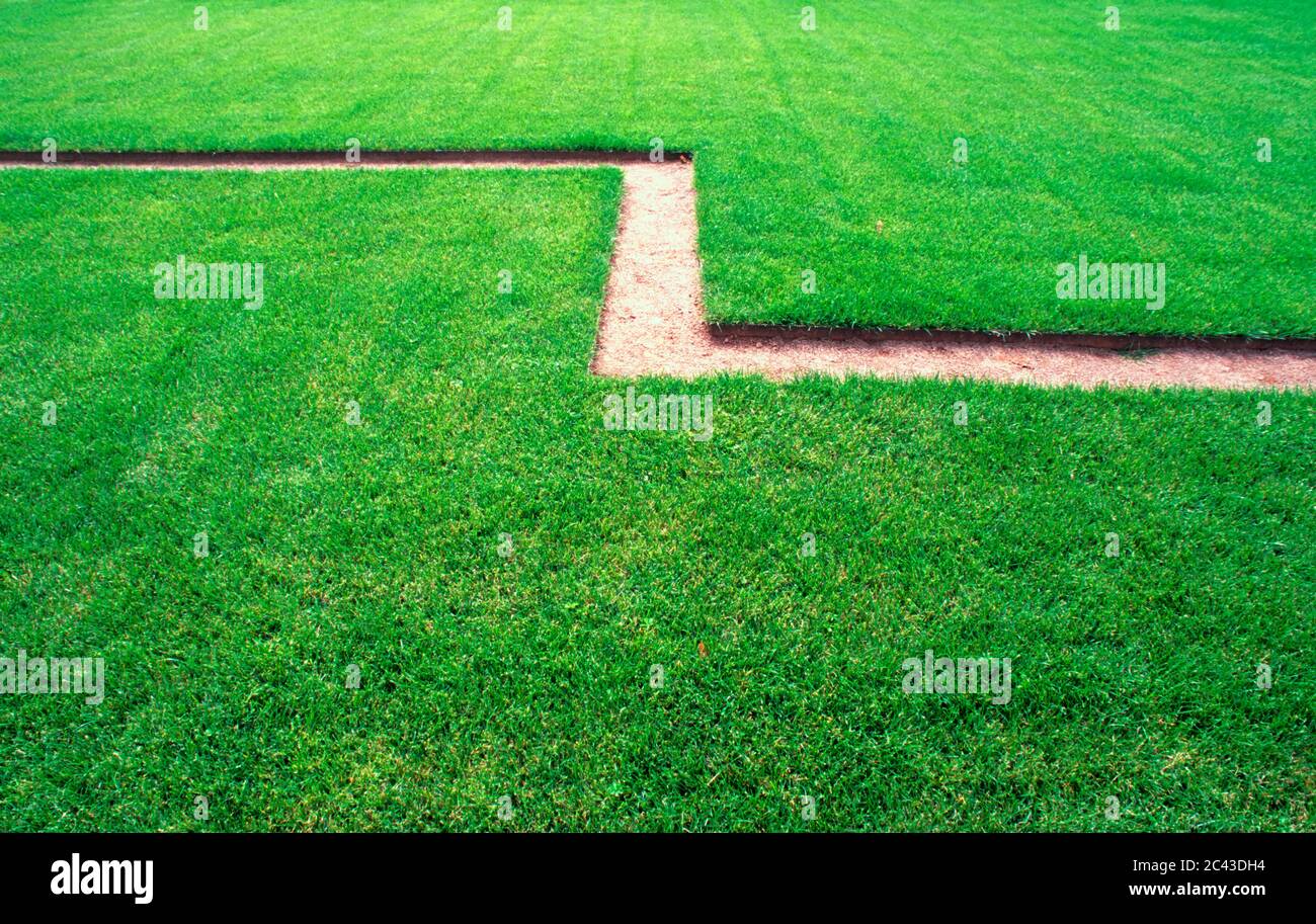 An angular pattern in the lawn Stock Photo - Alamy