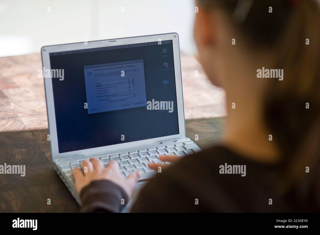 Girl with a laptop Stock Photo - Alamy