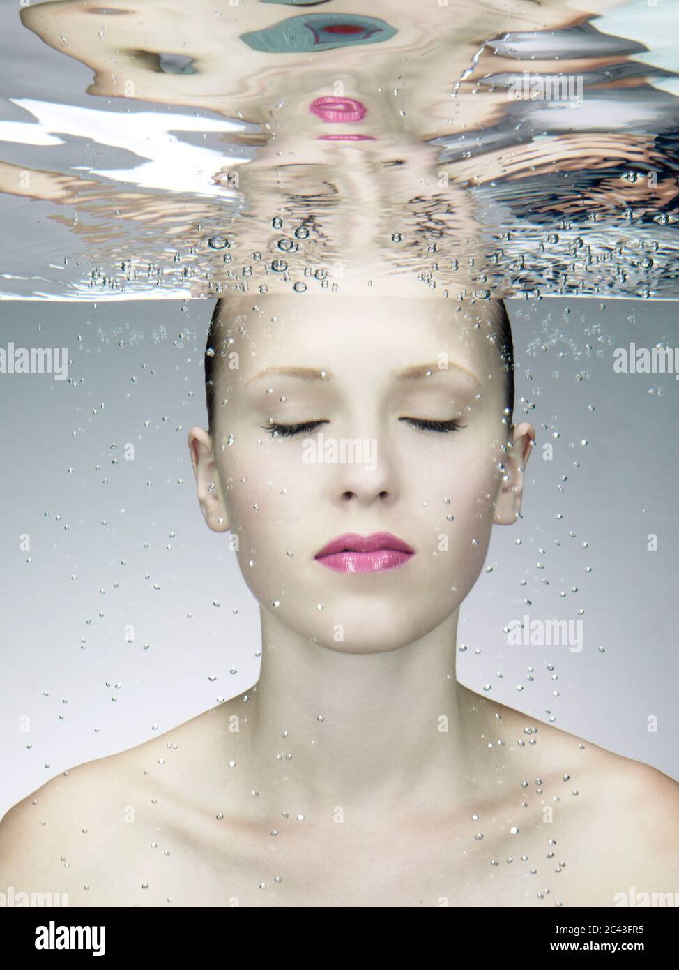 Young woman under water Stock Photo - Alamy